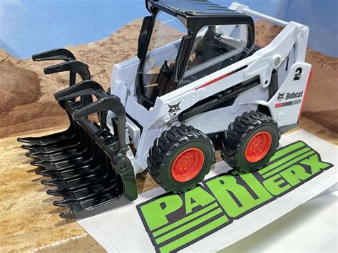 skid steer with grapple toy|best grapple for skid steer.